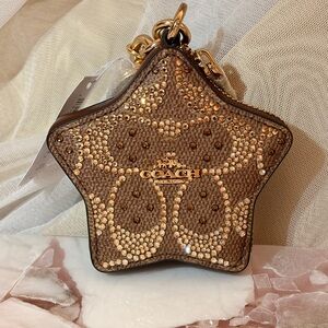 Coach Star-Shaped coin purse bedazzled